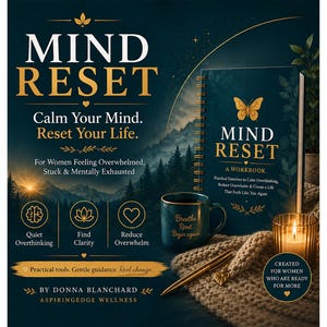 May include: A spiral-bound workbook titled Mind Reset with a dark teal cover featuring a gold butterfly. Beside it sits a dark teal mug with the text Breathe. Reset. Begin again., a gold pen, and a lit candle. The cover text reads Mind Reset.