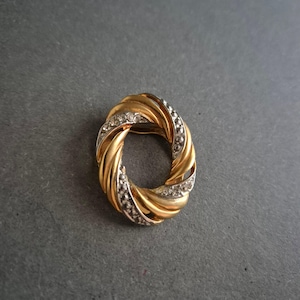 Spilla vintage placcata oro con strass – design circolare
