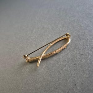 Spilla vintage placcata oro con strass