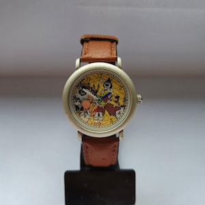 Reloj infantil con diseño de dibujos animados: reloj único con esfera colorida.