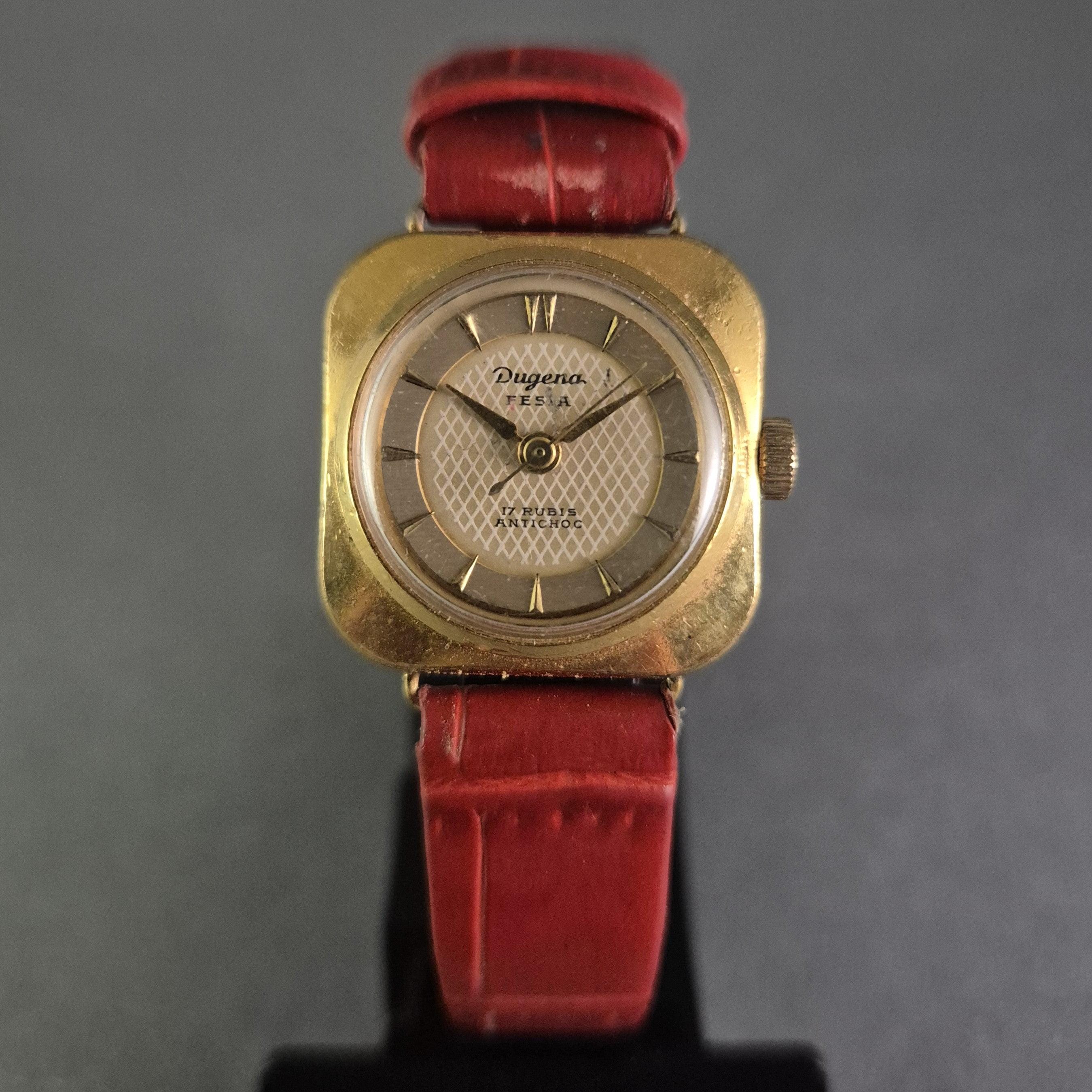 Gold dugena watch