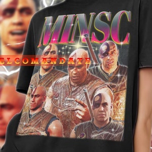 May include: A black t-shirt with a graphic print of a group of characters from the Dungeons & Dragons game. The characters are depicted in a retro style with a bright pink and yellow color scheme. The text "MINSC" is printed in large letters across the front of the shirt.