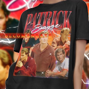 May include: A black t-shirt with a red graphic print of Patrick Swayze's face and the text "Patrick Swayze" in red. The graphic also includes the text "El Comandante" in red.