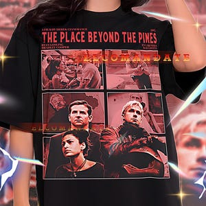 May include: Black unisex t-shirt with a graphic from the film "The Place Beyond the Pines." The design includes the film title, cast names, and a collage of images. The shirt is a 2XL size.
