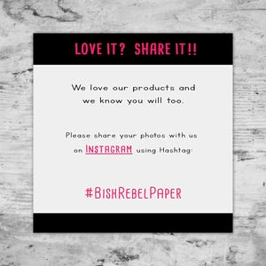May include: A white card with black borders and text that reads "LOVE IT? SHARE IT!!" and "We love our products and we know you will too." It also includes instructions to share photos on Instagram using the hashtag #BISHREBELPAPER.