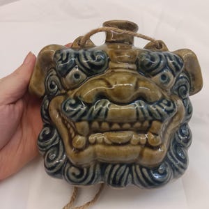 Okinawa shishi hip flask