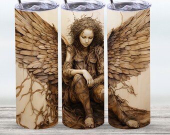 May include: Three stainless steel tumblers with a wood-grain design featuring a carved image of a woman with wings. The woman is sitting with her head down and her hands in her lap.