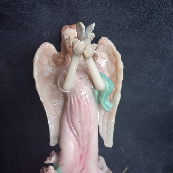 Vintage Angel holding Bird 4"