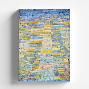 May include: Abstract painting with a geometric pattern of blue, yellow, green, and white squares and rectangles. The painting has a textured surface and a layered effect.