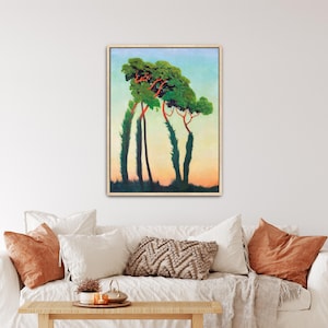 May include: A framed rectangular wall art print featuring a landscape painting of four tall, slender trees with vibrant green foliage and distinct reddish-orange trunks. The background shows a soft gradient sky transitioning from blue to yellow.