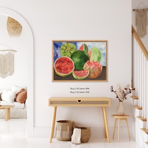 May include: Watercolor painting of watermelons, some whole and others sliced, with red flesh and green rinds. The painting is in a wooden frame. The text "Buy 3 & Save 18%" and "Buy 2 & Save 10%" is below the painting.