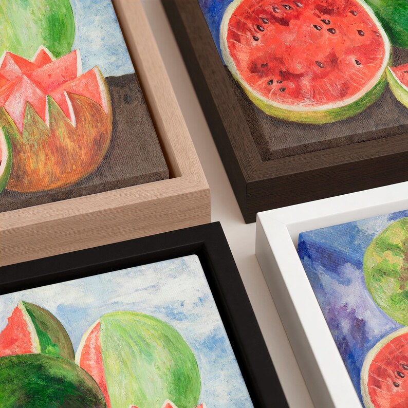 May include: Four framed canvas art pieces featuring watercolor paintings of watermelons. The watermelons are depicted in various states, including whole, sliced, and cut open, with a focus on their red and green colors. The frames are in black, white, brown, and natural wood.