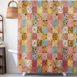 May include: A patchwork shower curtain with a vintage aesthetic. The curtain features a grid of colorful squares with floral and patterned designs in shades of yellow, red, and blue. The curtain is hanging in a bathroom setting.