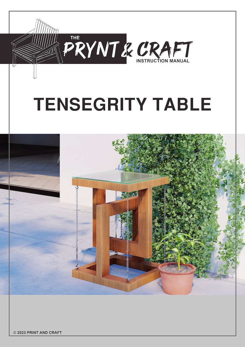 May include: A wooden table with a glass top and metal chains hanging from the frame. The table is in a garden setting with green plants and a white wall in the background. The text "THE PRYNT & CRAFT INSTRUCTION MANUAL" is at the top of the image. The text "TENSEGRITY TABLE" is below the title.