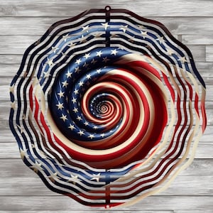 May include: A metal wind spinner with a spiral design featuring the American flag colors of red, white, and blue. The spinner has multiple layers of metal that create a swirling effect.