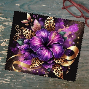 May include: A purple and gold floral design with a black background. The design features a large purple hibiscus flower with gold accents and a leopard print pattern.
