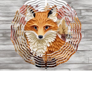 May include: A metal wind spinner with a layered design featuring a fox with orange, white, and brown fur. The fox is surrounded by leaves in shades of red, orange, and brown.