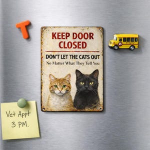 May include: A set of three ceramic mugs with a speckled, matte finish. The mugs are in shades of cream, light brown, and dark brown. Each mug has a simple, minimalist design and a rounded handle. The mugs are likely for coffee or tea.