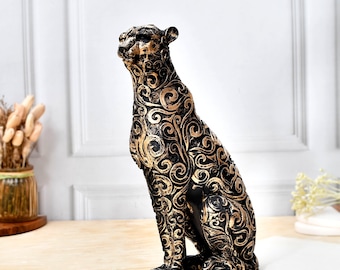 Black and Gold Leopard Statue Sitting on Table black and gold leopard statue resin leopard figurine black and gold home décor
