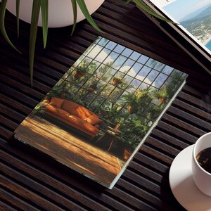 May include: A dark brown slatted coffee table with a white potted plant, two magazines, and a cup of coffee. One magazine is titled "TRAVEL MAGAZINE" and the other is titled "ARCHITECTO BE". The magazines feature images of a landscape and a greenhouse.