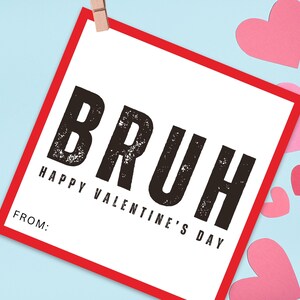 May include: A red and white card with the word "BRUH" in black block letters and the text "Happy Valentine's Day" below. The card has a blank space for a name at the bottom.