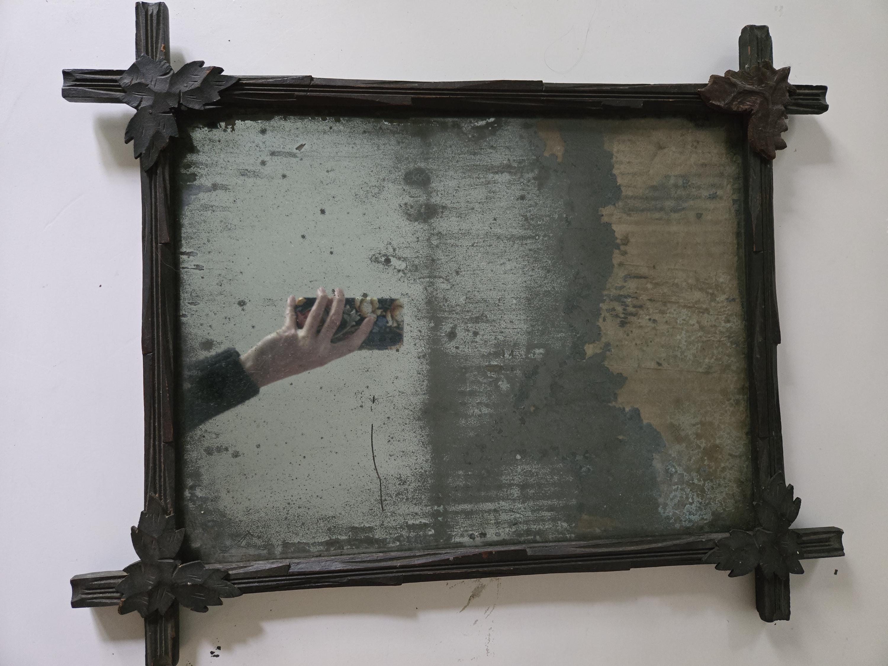 Antique Adirondack framed mirror