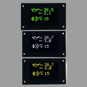 May include: Three black rectangular displays with white and green text showing engine temperature, oil pressure, and engine speed. The displays show the following readings: C: 38.5, Bar: 3.1, AGT 15; C: 38.7, Bar: 3.0, AGT 15; C: 38.7, Bar: 3.0, AGT 15.