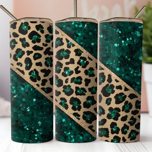 May include: Three stainless steel tumblers with a green and gold glitter design. The tumblers feature a leopard print pattern with a diagonal gold glitter stripe.