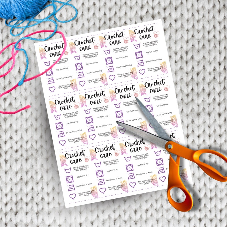 May include: A sheet of printable crochet care labels with instructions for washing, drying, ironing, and other care instructions. The labels feature a colourful ombre design with a crocheted flower and the text "Crochet care" repeated on each label.
