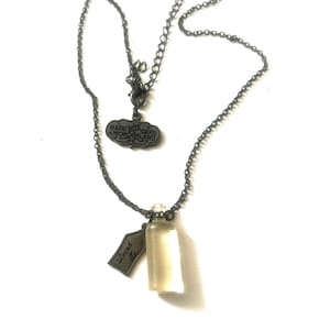Disney Couture Alice in Wonderland Drink Me Necklace