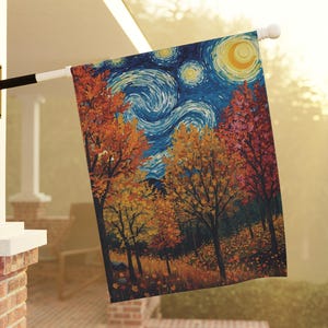 May include: A rectangular garden flag featuring a vibrant autumn forest scene with orange, yellow, and red trees under a swirling blue night sky with a prominent yellow moon, mounted on a white pole attached to a brick porch pillar.