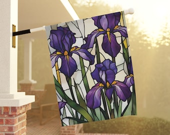 May include: A stained glass style garden flag featuring purple irises with yellow centers. The flag is white with green stems and leaves.