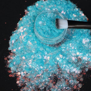 Mermaid light  holographic glitter , resin supplies , nail art glitter , craft supplies , festival art   Real photo and video. NO  filters.