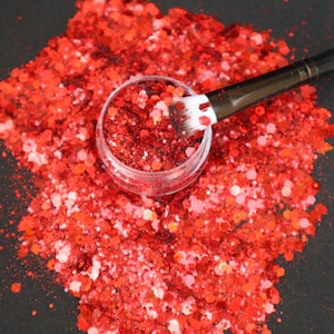 Glitter olografico rosso: resina metallizzata e prodotti per nail art
