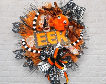 orange and black spooky wreath| spider Halloween wreath| orange Halloween| Halloween door wreath| all hallows eve| spider web wreath
