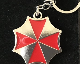 Resident Evil/Umbrella Company Schlüsselanhänger mit Geschenktüte