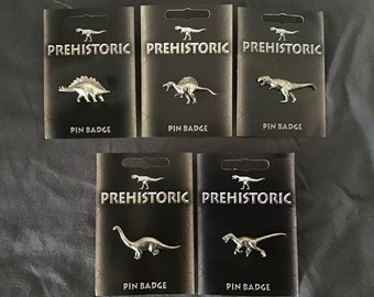 Various Prehistoric Themed Sliver Pewter Pin Badges