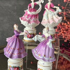 書 Coalport Figurines and Collectables A group of four limited edition Coalport figurines