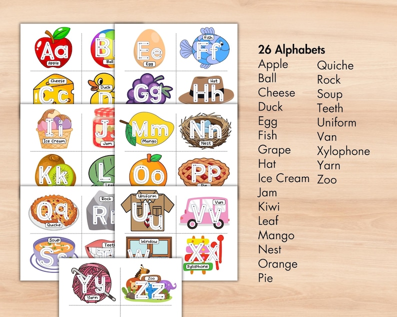 May include: Educational alphabet flashcards featuring colorful illustrations for each letter, including an apple, ball, cheese, duck, egg, fish, grape, hat, ice cream, jam, kiwi, leaf, mango, nest, orange, and pie. The text "26 Alphabets" is also included.