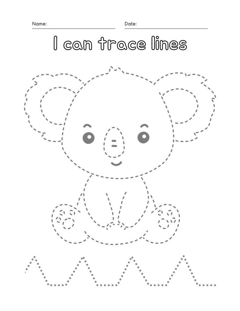 Peut inclure: Un dessin au trait noir et blanc d'un koala. Le koala est assis, les jambes crois&eacute;es, et a un grand sourire. L'image est intitul&eacute;e "Je peux tracer des lignes".