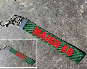 County Mayo Wristlet. Irish and English. Gaelic Games. Hurling, Camogie, Football, Ladies Football, Handball. IRL. Keyring, keychain.