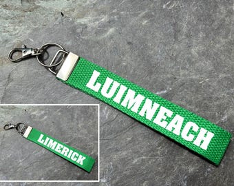 County Limerick Wristlet. Irish and English. Gaelic Games. Hurling, Camogie, Football, Ladies Football, Handball. IRL. Keyring, keychain.