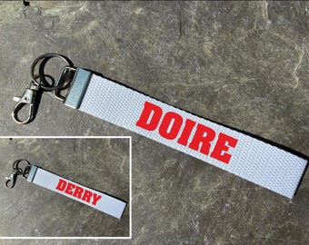 County Derry Wristlet. Irish and English. Gaelic Games. Hurling, Camogie, Football, Ladies Football, Handball. IRL. Keyring, keychain.
