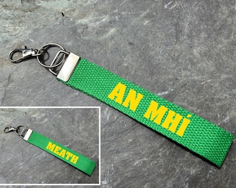 County Meath Wristlet. Irish and English. Gaelic Games. Hurling, Camogie, Football, Ladies Football, Handball. IRL. Keyring, keychain.