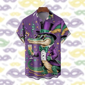 May include: Purple button-down shirt featuring a cartoon alligator in a top hat, sunglasses, and a tuxedo, holding a champagne flute. The alligator is green, with a purple jacket and green bow tie. The shirt has a pattern of confetti and stars.