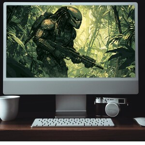 May include: A computer monitor displaying a digital illustration of a green and black alien creature holding a gun in a jungle setting.