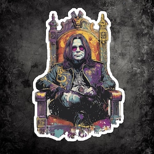 May include: A sticker featuring a stylized illustration of a person with long hair and sunglasses seated on a throne. The person is wearing a jacket with gold accents and a pendant. The throne is ornate, with a gold and purple color scheme.