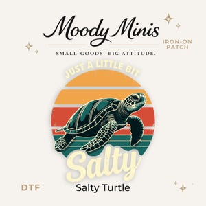 May include: An iron-on patch featuring a dark green sea turtle swimming in front of a circular sunset graphic with orange, red, and teal stripes. The text reads Moody Minis, Small Goods. Big Attitude., Just A Little Bit Salty, and Salty Turtle.