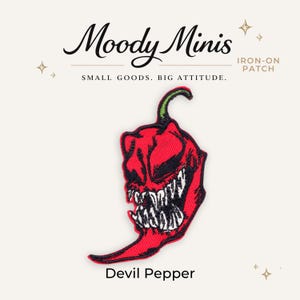 May include: An embroidered iron-on patch featuring a red chili pepper with a green stem and a stylized, aggressive face with sharp white teeth and black shading. The text Moody Minis, IRON-ON PATCH, SMALL GOODS. BIG ATTITUDE., and Devil Pepper appear.