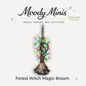 May include: An embroidered iron-on patch featuring a broomstick wrapped in green vines with small purple and yellow flowers. The text Moody Minis, IRON-ON PATCH, SMALL GOODS. BIG ATTITUDE., and Forest Witch Magic Broom are printed around the patch.